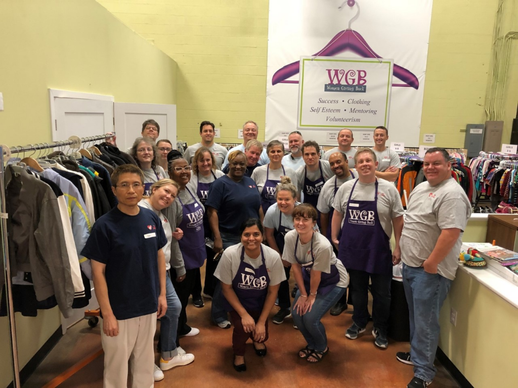 Group photo of PASS coworkers volunteering